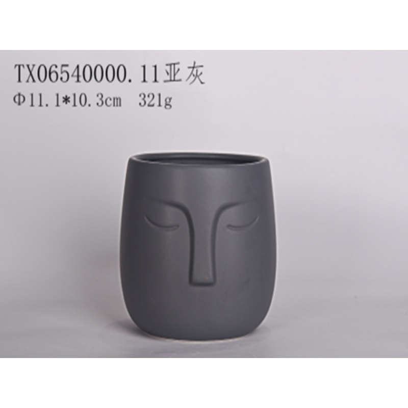 Artistic Grey Face Planter Pot – Bring Personality to Your Greenery